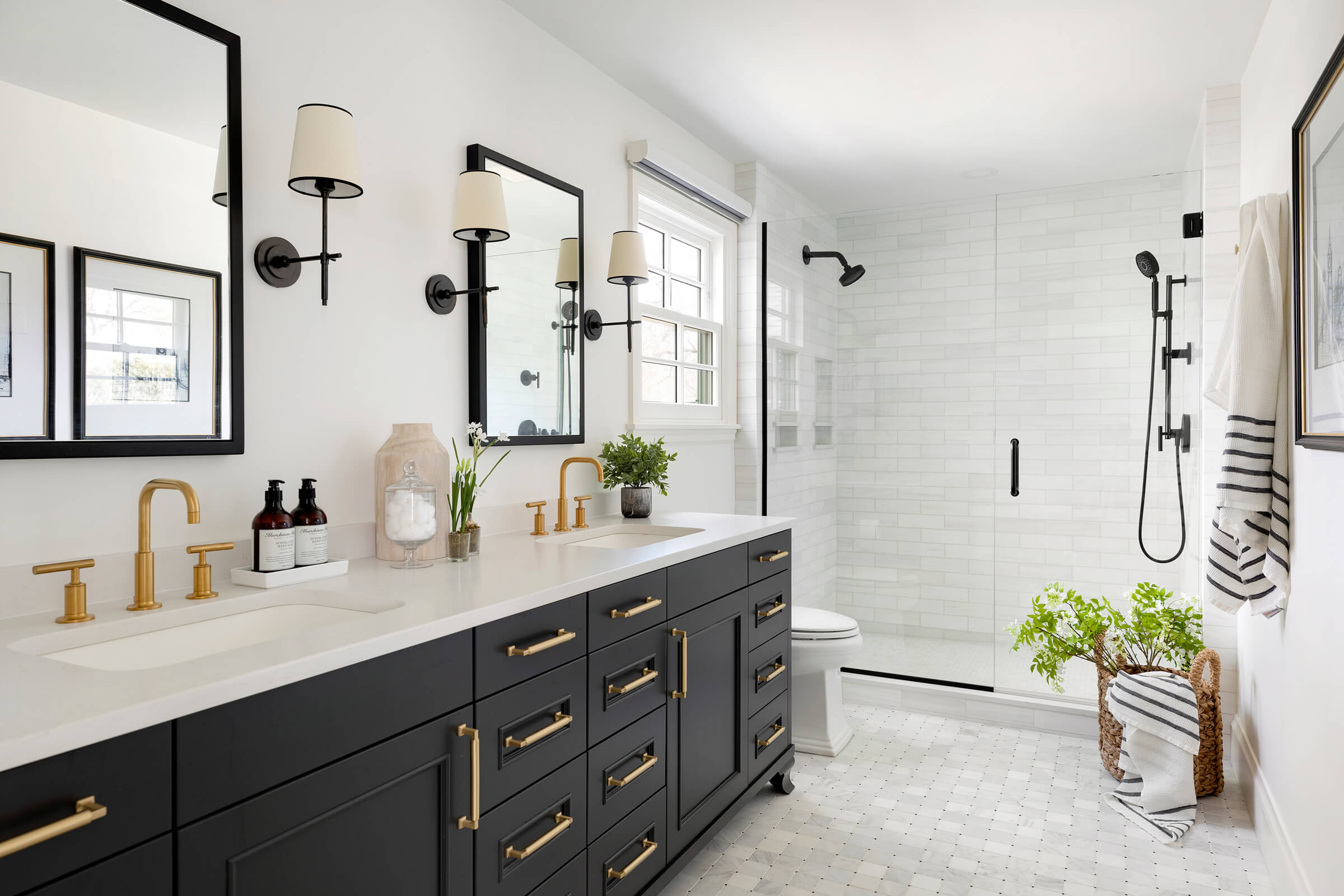 After: The completed vanity area featuring modern lines and bright lighting.
